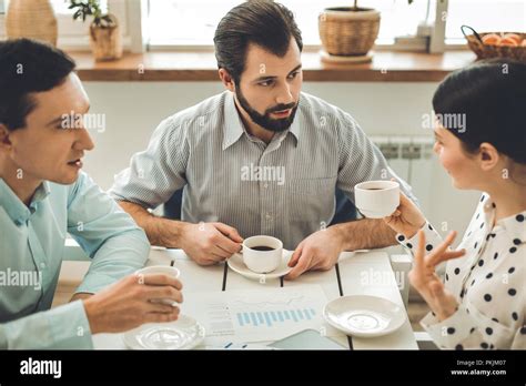 Smart Nice Young People Having Coffee Together Stock Photo Alamy