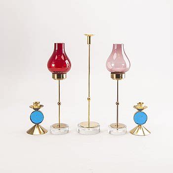 Gunnar Ander A Set Of Five Different Brass And Glass Candle Sticks