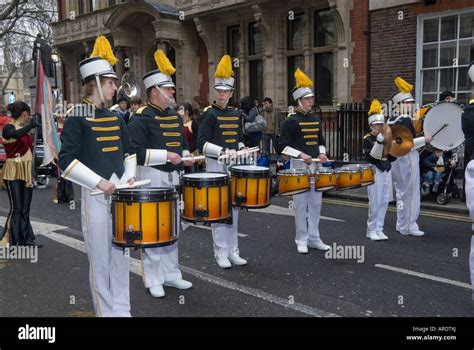 Drummers And A Cymbal Player From A Us High School Marching Band Line