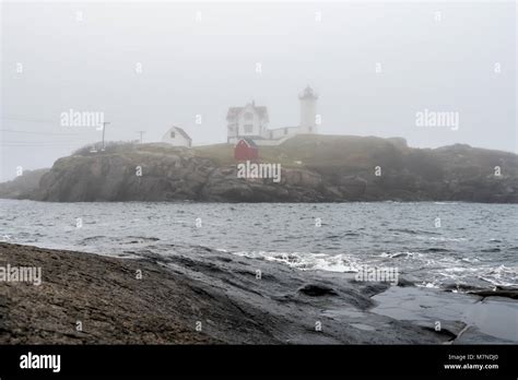 Nubble Light - Cape Neddick Lighthouse in Fog Stock Photo - Alamy