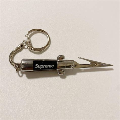 Supreme Supreme Folding Roach Clip Switch Blade Keychain Black Comb