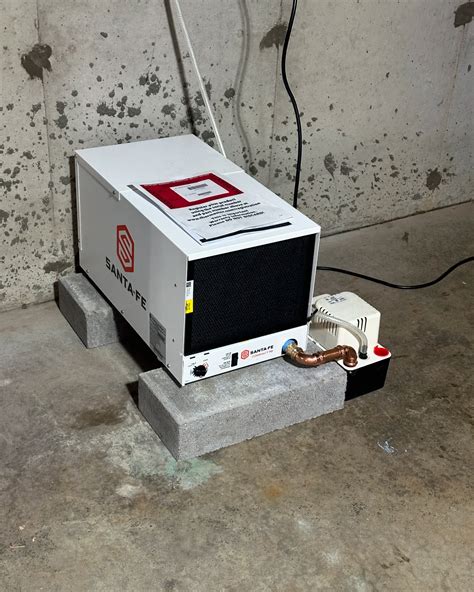 Pine Ridge Plumbing | Santa- Fe compact 70 dehumidifier with condensate