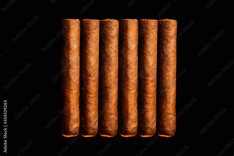 A Vertical Look Of Fresh Hand Cooked New Cigars Concept Of A