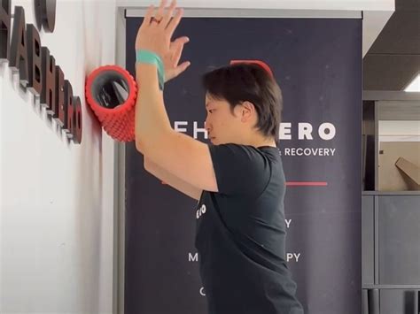 Banded Foam Roller Wall Slide — Rehab Hero