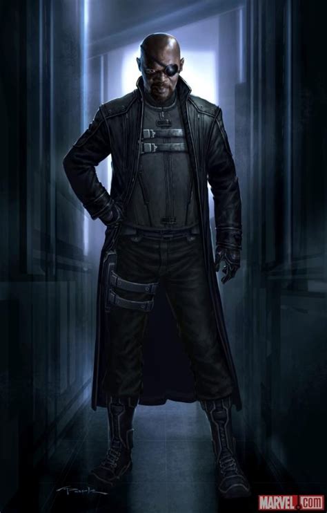 A Man Standing In The Dark With His Hands On His Hips Wearing A Leather