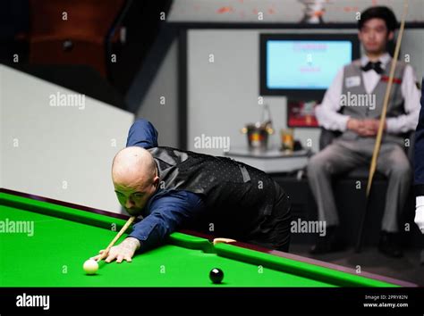 Luca Brecel In Action Against Si Jiahui Right On Day Thirteen Of The