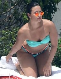 Demi Lovato Tanning Her Fat Ass In A Bikini