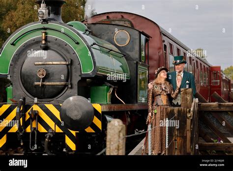 Couple In Front Of Steam Train At Rowsley Peak District Derbyshire Uk