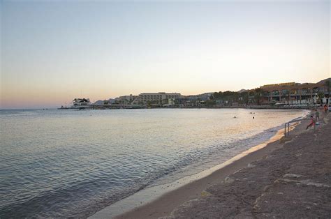 Calm Water Of Sea Near Beaches And Photograph by Barry Winiker - Fine ...