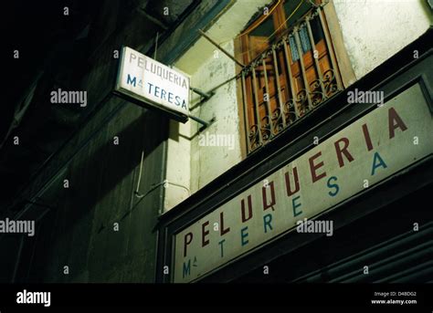 Shop sign, night, Barcelona, Spain Stock Photo - Alamy