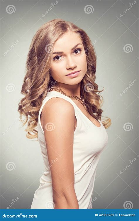 Woman With Blonde Hair And Brown Eyes