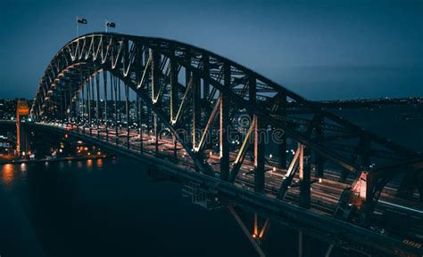 Drone Shot Of The Sydney Harbour Bridge Under Blue Twilight Sky In