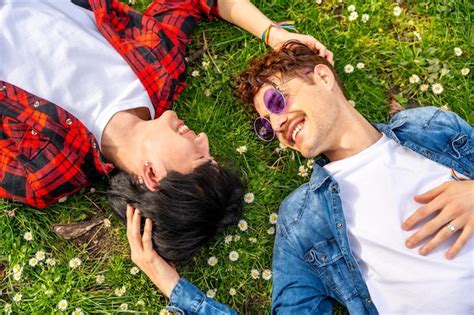 Premium Photo Gay Couple Lying On The Grass Together