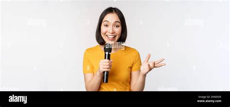 Image Of Young Asian Woman Talking In Microphone Perfom With Mic