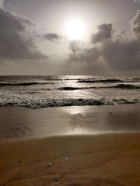 Premium Photo | Cloudy sunset on aksa beach in mumbai just before monsoon