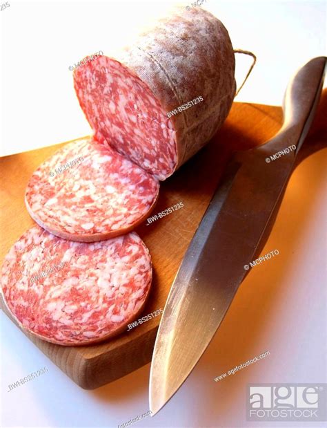 Cutting Board With Knife And Salami Stock Photo Picture And Rights