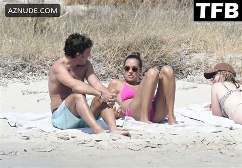 Andrea Schlager Sexy Seen Flaunting Her Hot Figure Wearing A Pink Bikini At The Beach In Greece