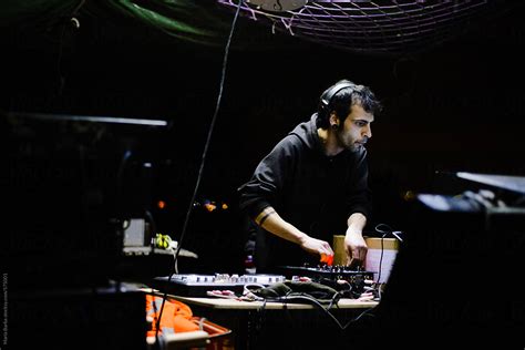 Male Hardcore DJ At A Rave Party by Stocksy Contributor María Barba Stocksy