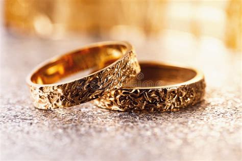 Two Gold Wedding Rings On The Table Stock Photo Image Of Marry