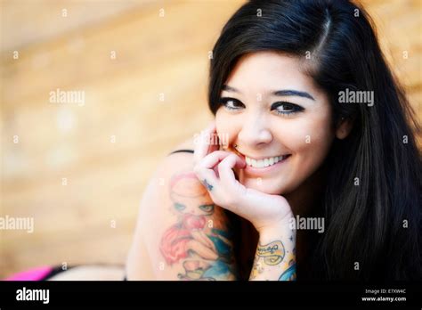 Young Smiling Woman With Tattoos Stock Photo Alamy