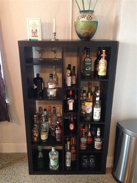 Liquor Shelf At Aaron S He Got It From Ikea For Wall Shelves