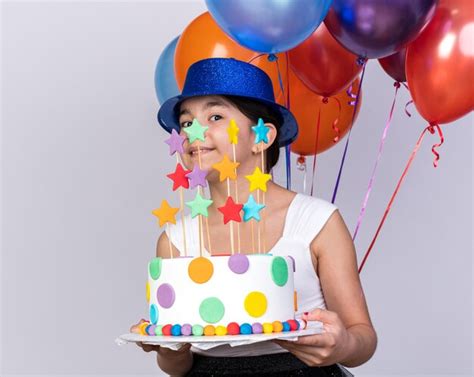 Heureuse Jeune Fille Caucasienne Avec Un Chapeau De F Te Bleu Tenant