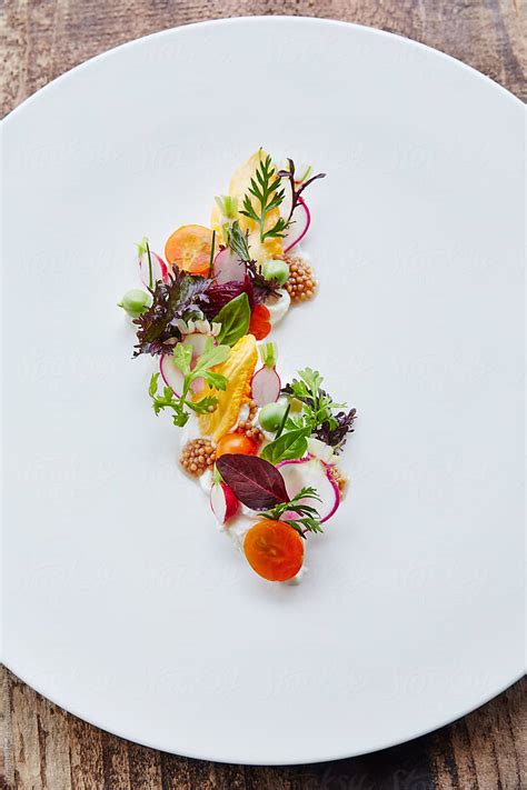 Fresh Burrata Mozzarella Salad With Veggies By Stocksy Contributor