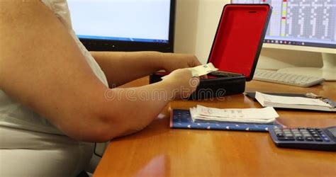 Mature Business Woman Taking Off Her Black High Heels After A Long Day At Work Stock Footage