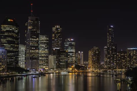 Architectural Photography Of High Rise Buildings Near The Body Of Water