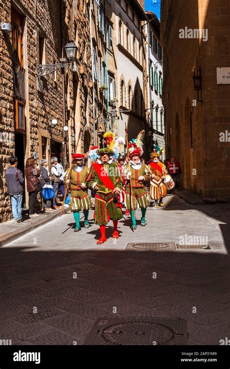 Italian Men Walk In A Historical Parade Dressed In Traditional Clothes