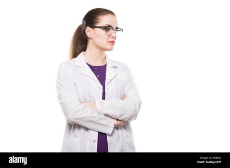 Attractive Caucasian Brunette Female Doctor Standing In Office With