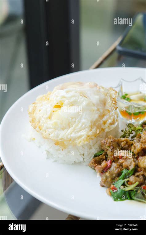 Stir Fried Minced Pork With Chili Sweet Basil Served With Steamed