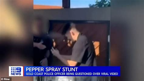 Bizarre Moment A Man Pepper Sprays Himself In The Face As A Policeman