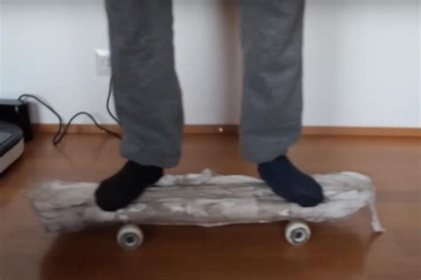 Hydraulic Press Turns 20 Rolls Of Toilet Paper Into Skateboard