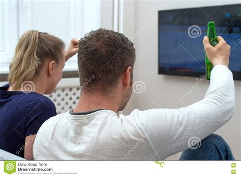 Excited Couple Watching Hockey Stock Photo Image Of Skate Match