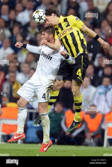 Dortmund S Neven Subotic R And Real S Sergio Ramos Vie For The Ball