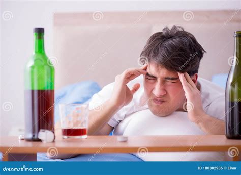 The Man Alcoholic Drinking In Bed Going Through Break Up Depression