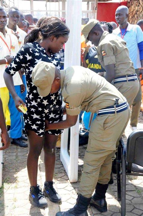 Photos Of Ugandan Police Fondling Women In The Name Of Security Checks