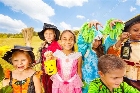 Friends in Halloween costumes Stock Photo by ©serrnovik 52853339