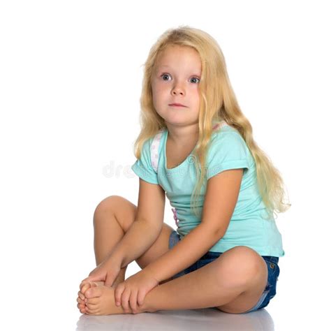 Little Girl Is Sitting On The Floor Stock Photo Image Of Expression
