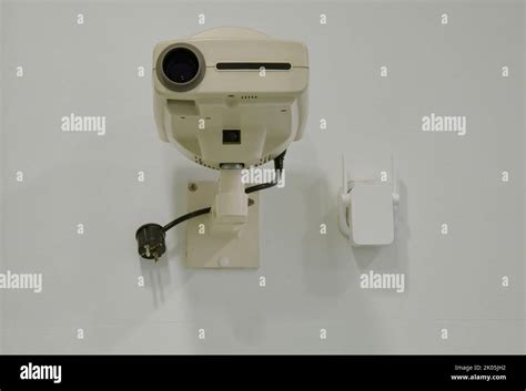 Projector Hanging On The Wall Stock Photo Alamy