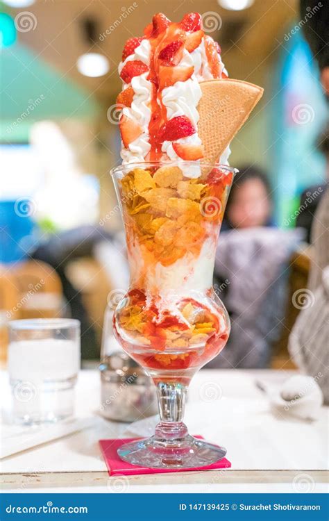 Strawberry Sundae Tower Ice Cream With Whip Cream And Strawberry Sauce Stock Image Image Of