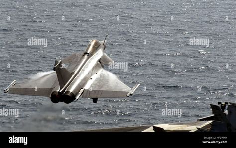 A French Rafale aircraft from the nuclear-powered aircraft carrier ...