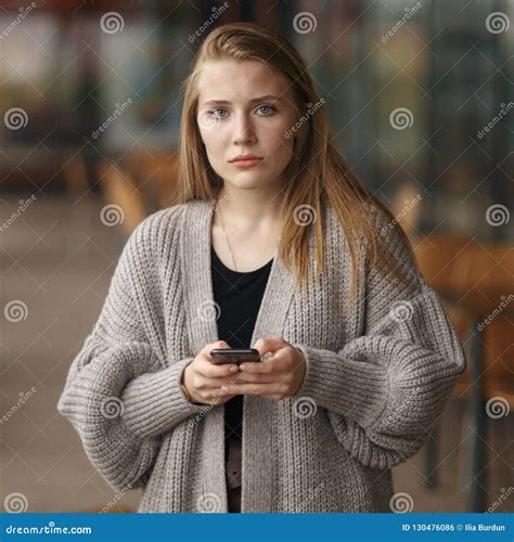 Closeup Side Profile Portrait Upset Sad Skeptical Unhappy Serious Woman Talking Texting On Phone