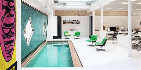 The Groovy New Paris Office of a Creative Agency Features a Chic Indoor Swimming Pool ...