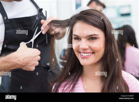 Pretty Brunette Getting Her Hair Cut Stock Photo Alamy