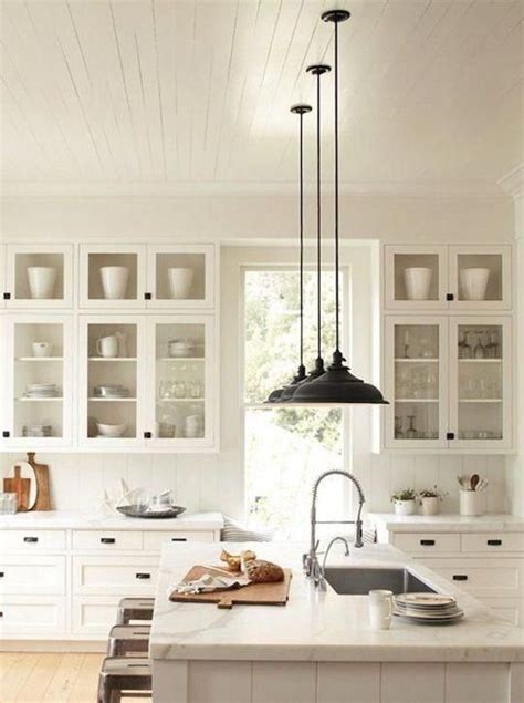 Kitchens That Ll Never Go Out Of Style All White Kitchen With Black