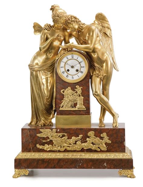 CUPID AND PSYCHE A LARGE EMPIRE STYLE GILT BRONZE MOUNTED ROUGE