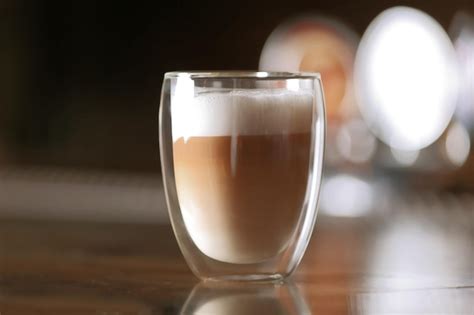 Premium Photo Cup Of Hot Coffee In Cafe