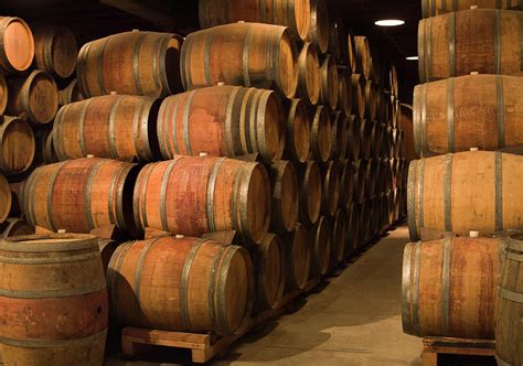 Wine Barrels In Winery Cellar Of Napa Photograph By Yinyang Fine Art